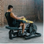 Профессиональный тренажер для икроножных мышц с дисковой нагрузкой Technogym Seated Calf (Pure Strength)
